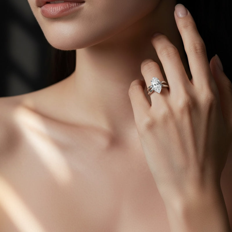 Model wearing marquise east west solitaire fancy ring