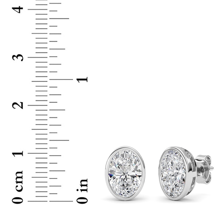 4Cttw Oval Shaped Lab Grown Diamond (F/VS) Bezel Set Stud Earrings in 14K Gold