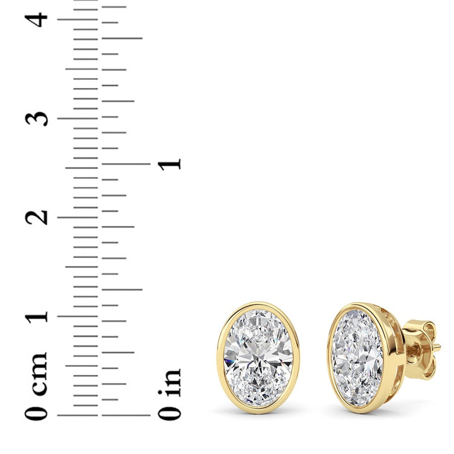 4Cttw Oval Shaped Lab Grown Diamond (F/VS) Bezel Set Stud Earrings in 14K Gold