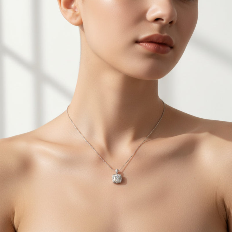 Model wearing round halo pendant