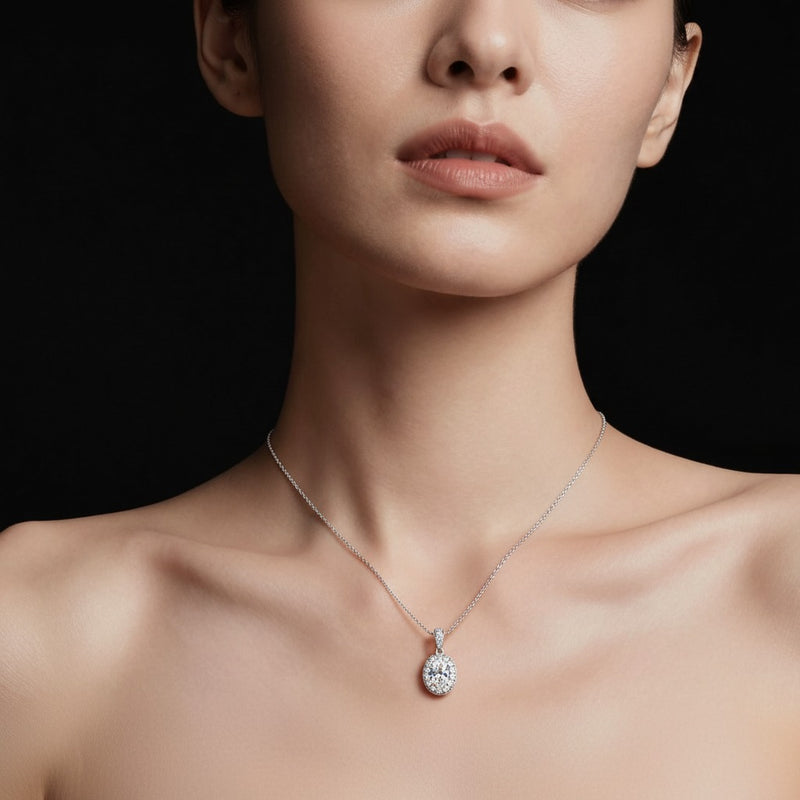 Model wearing oval pendant