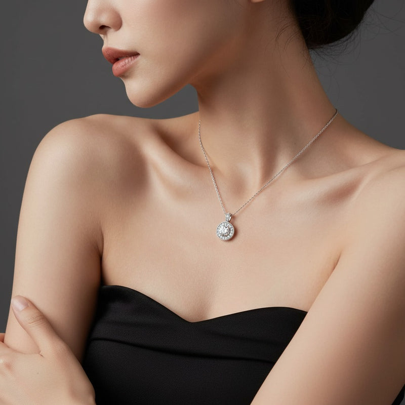 Model wearing round halo pendant
