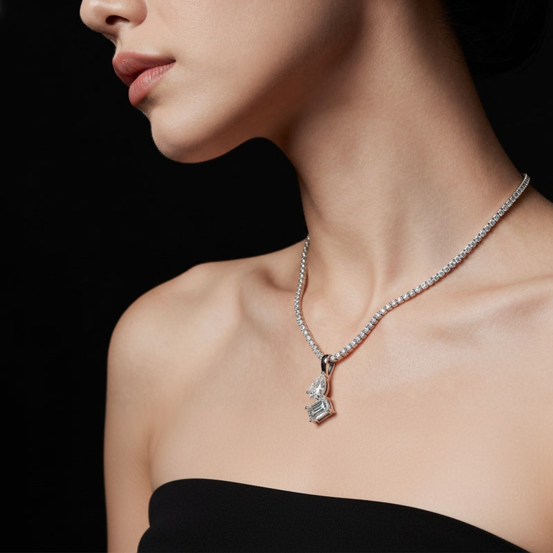 Model wearing emerald toi et moi pendant