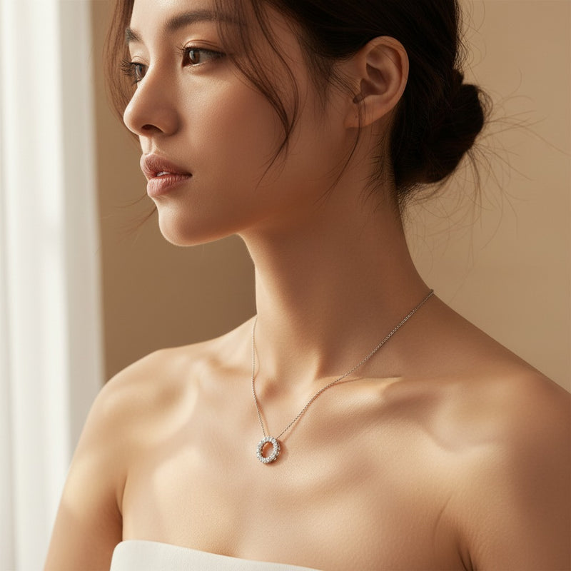 Model wearing round circle pendant