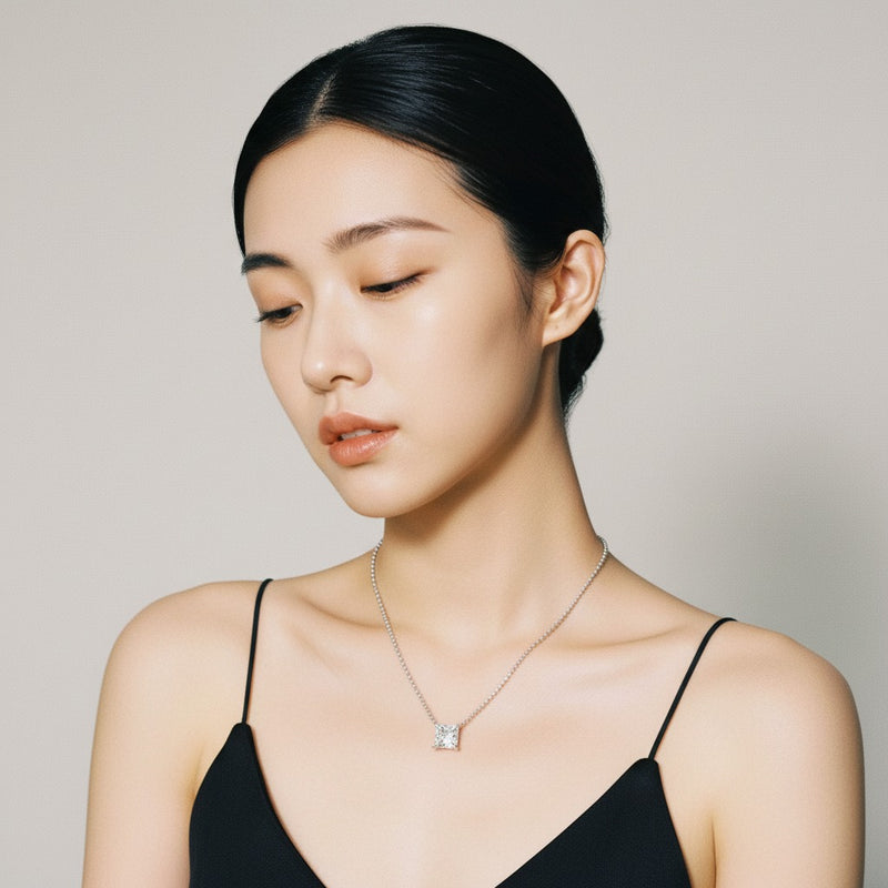 Model wearing princess solitaire necklace