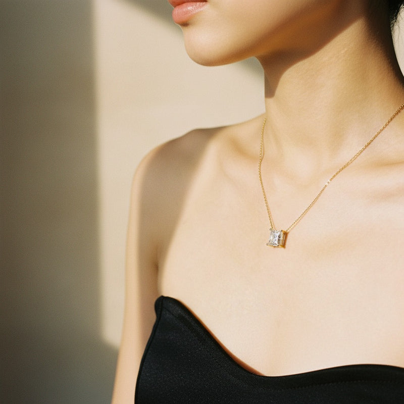 Model wearing princess solitaire necklace