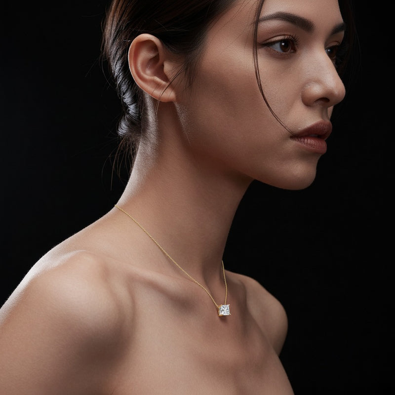 Model wearing princess solitaire necklace