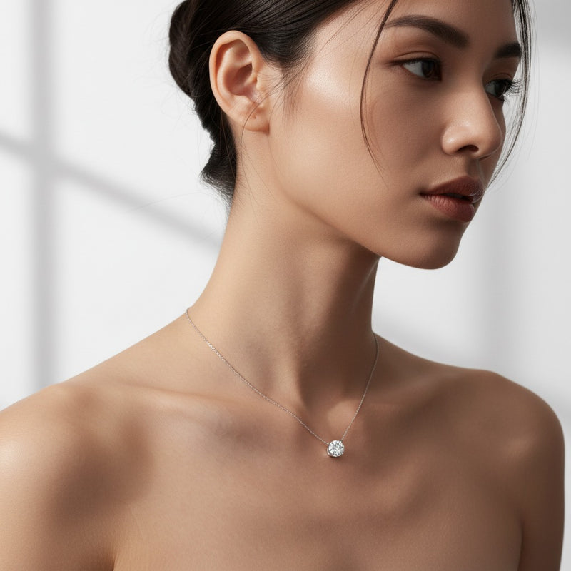 Model wearing round necklace