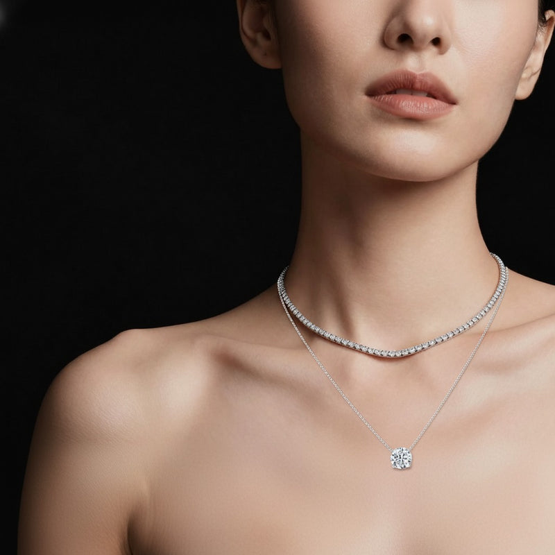 Model wearing round solitaire necklace