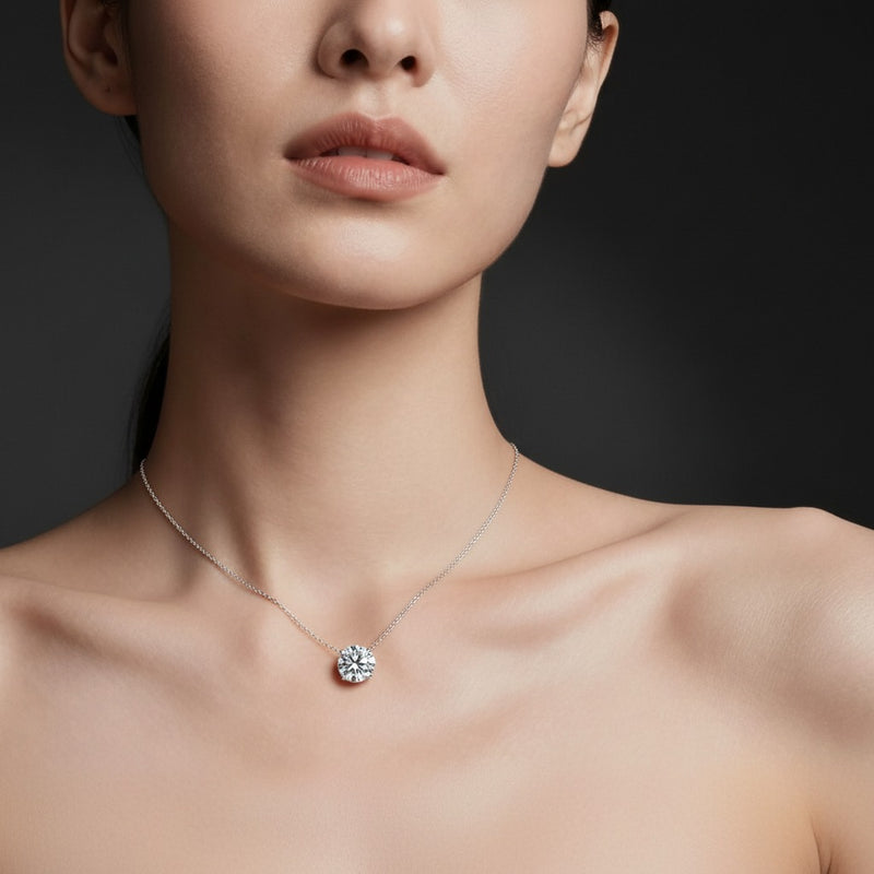 Model wearing round necklace