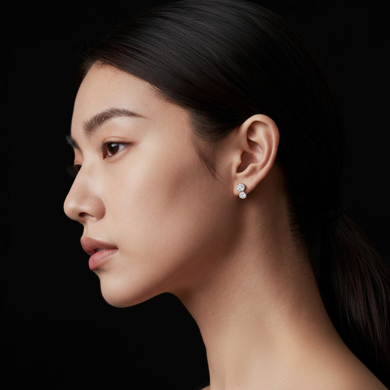 Model wearing round tulip head stud earrings