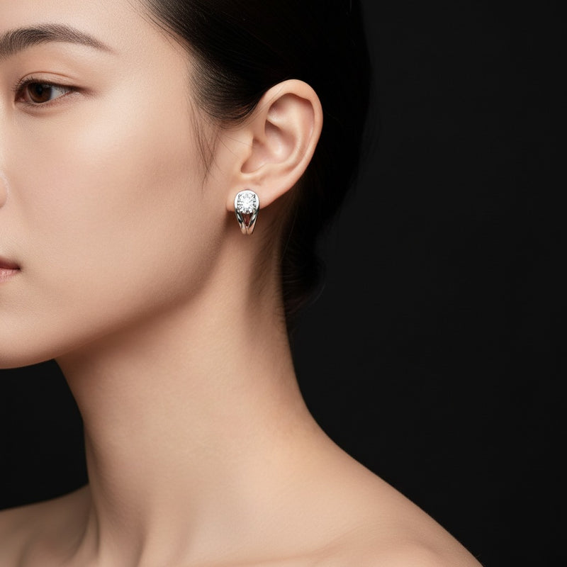 Model wearing oval fashion earrings
