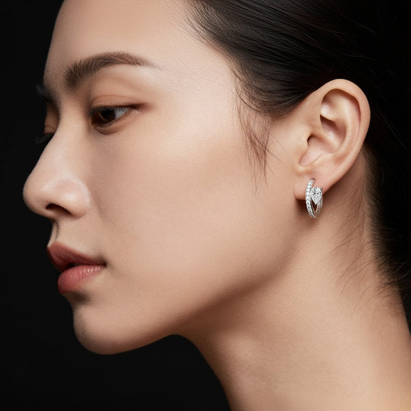 Model wearing pear fashion earrings