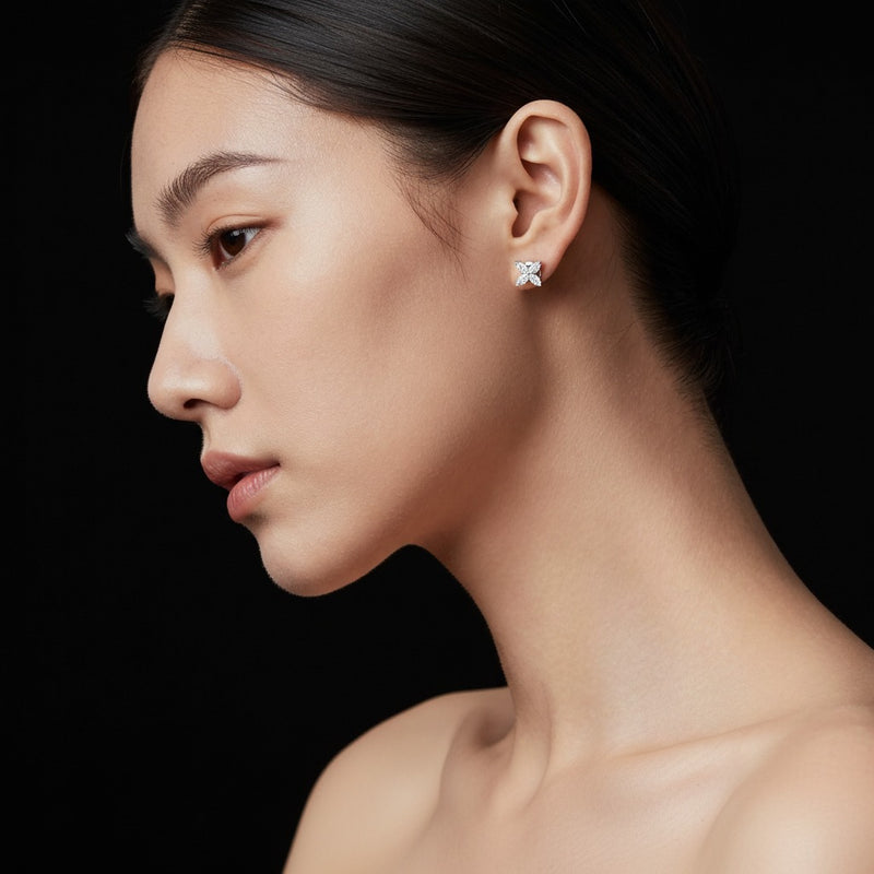 Model wearing marquise flower earrings