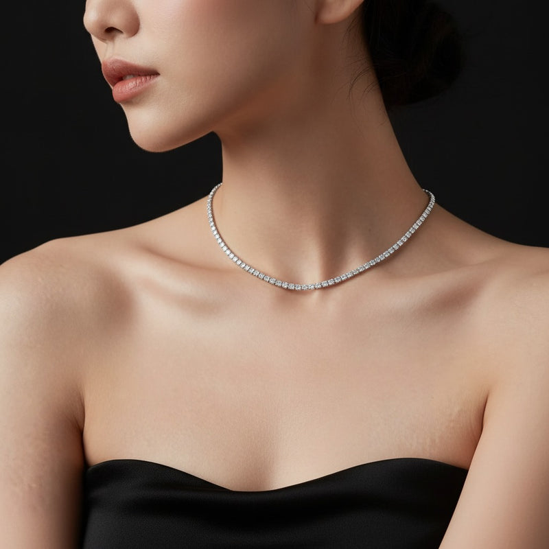 Model wearing round graduating half riviera necklace