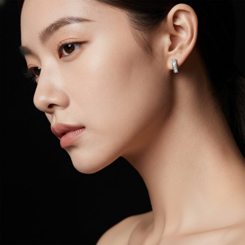 Model wearing princess classic basket set stud earrings