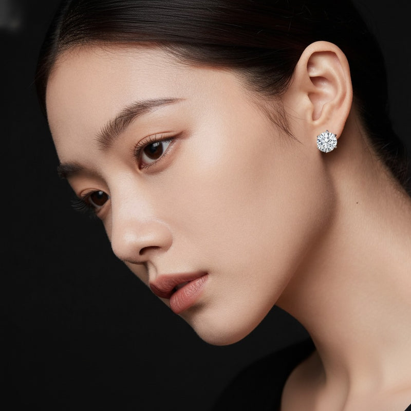 Model wearing round lab grown diamond f vvs classic basket set stud earrings