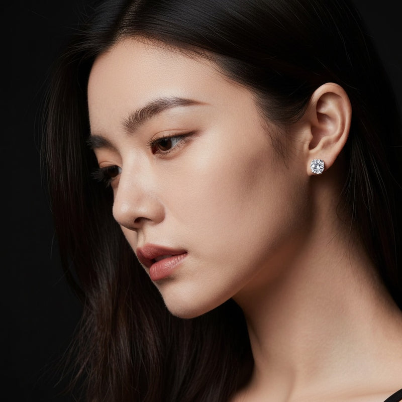 Model wearing round hidden halo stud earrings
