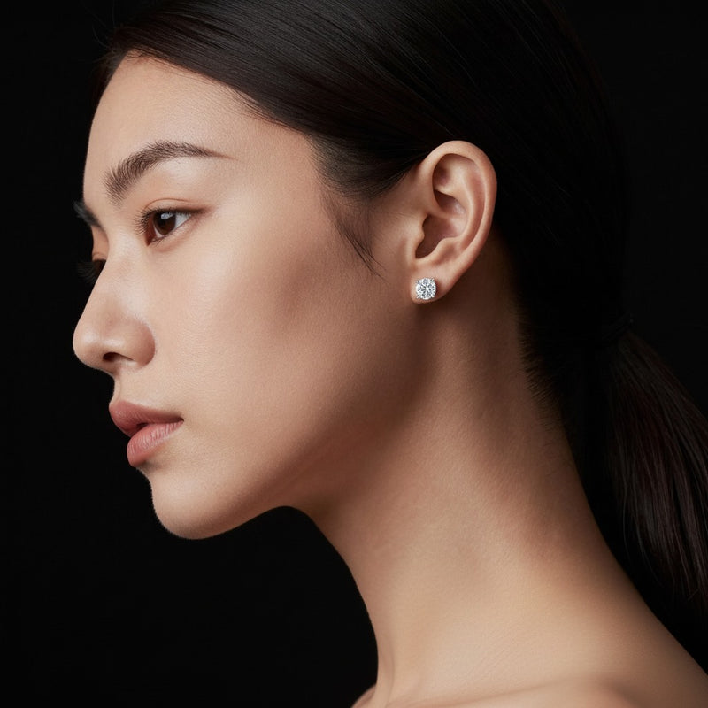 Model wearing round hidden halo stud earrings