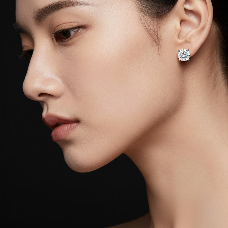 Model wearing round hidden halo stud earrings