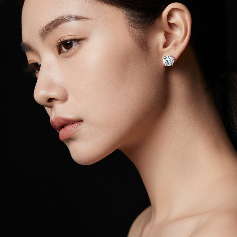 Model wearing round hidden halo stud earrings