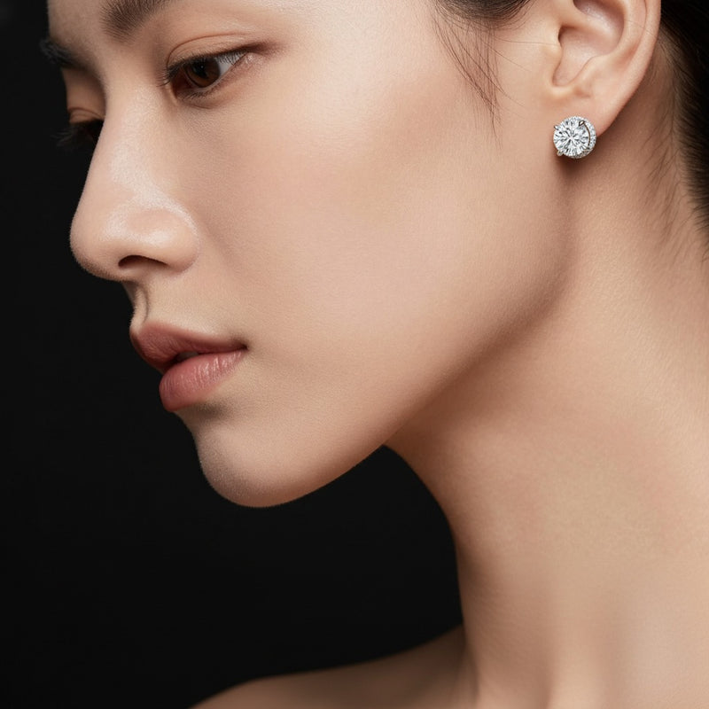 Model wearing round hidden halo stud earrings