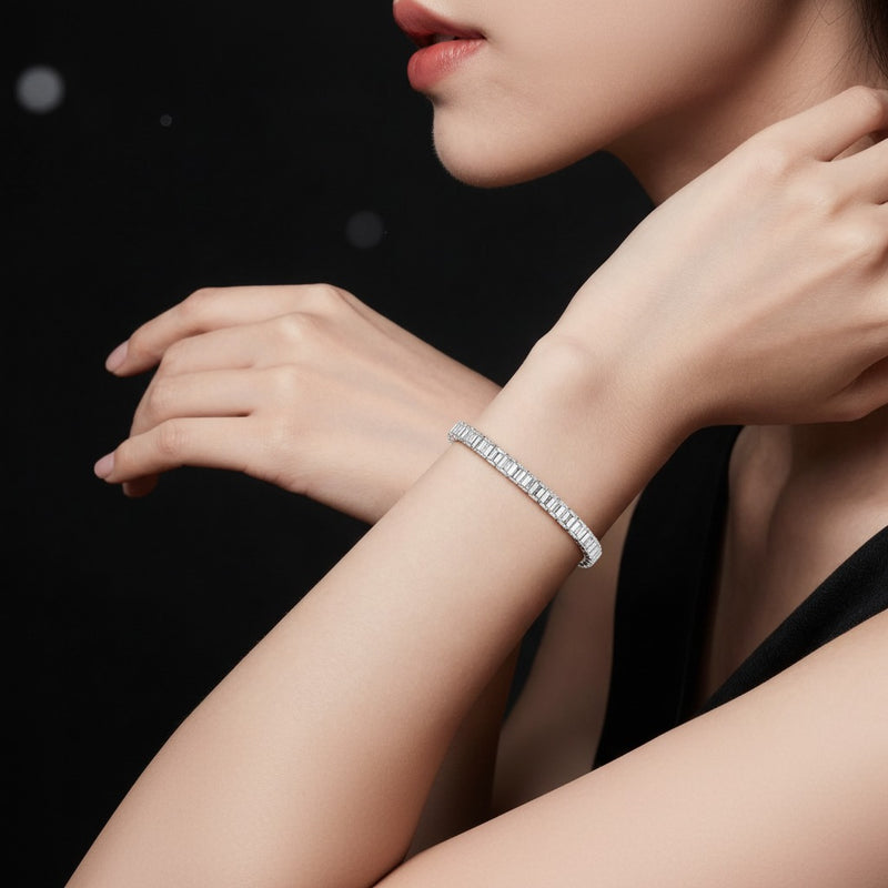 Model wearing emerald classic line bracelet
