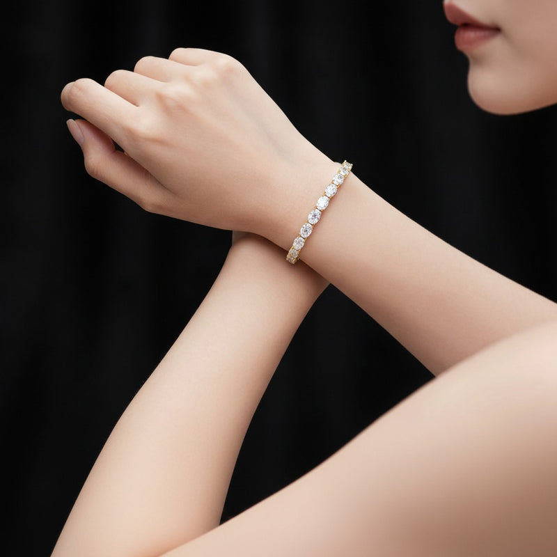 Model wearing oval tennis bracelet
