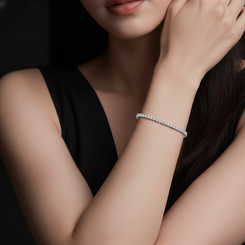 Model wearing round tennis bracelet