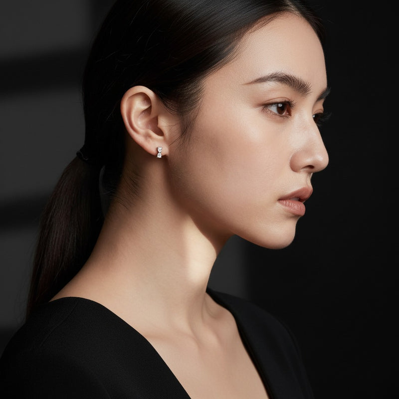 Model wearing mixed toi et moi fashion earrings