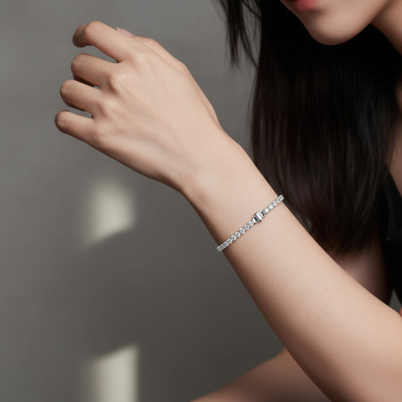 Model wearing round tennis bracelet