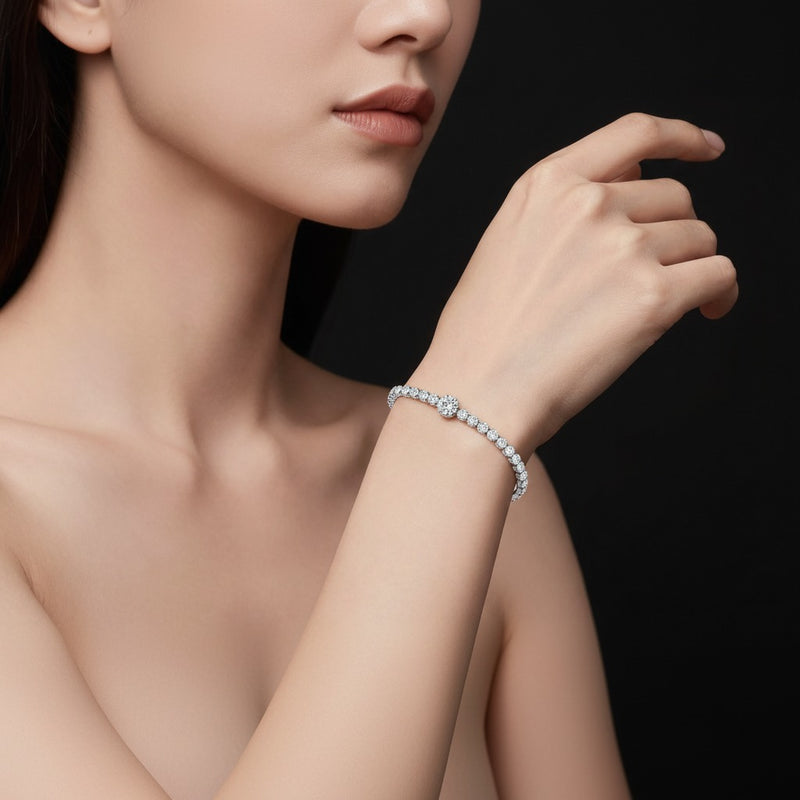 Model wearing round tennis bracelet