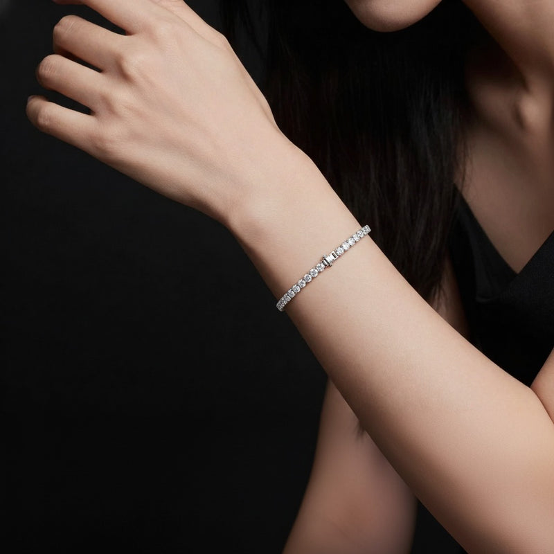 Model wearing round tennis bracelet