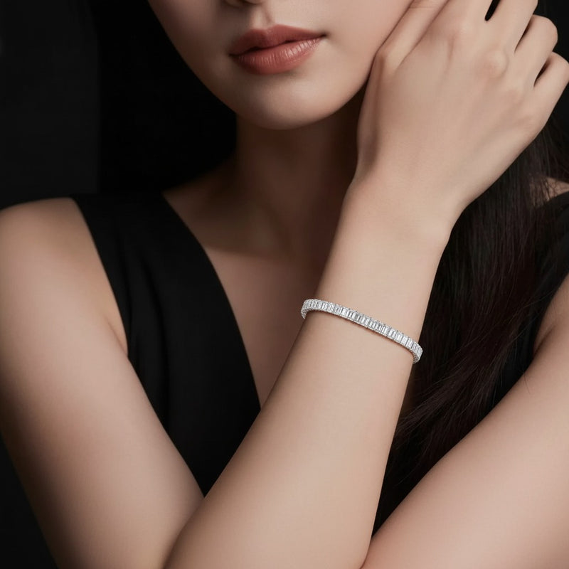 Model wearing emerald east west line bracelet