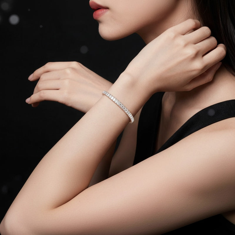 Model wearing emerald east west line bracelet