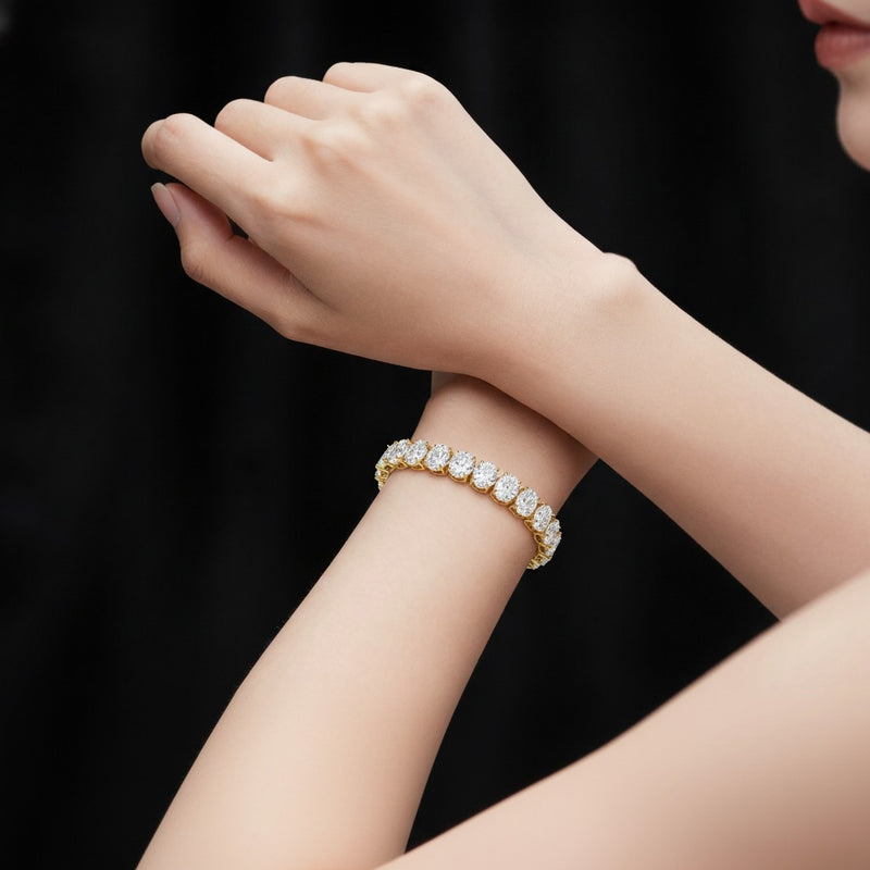 Model wearing oval tennis bracelet