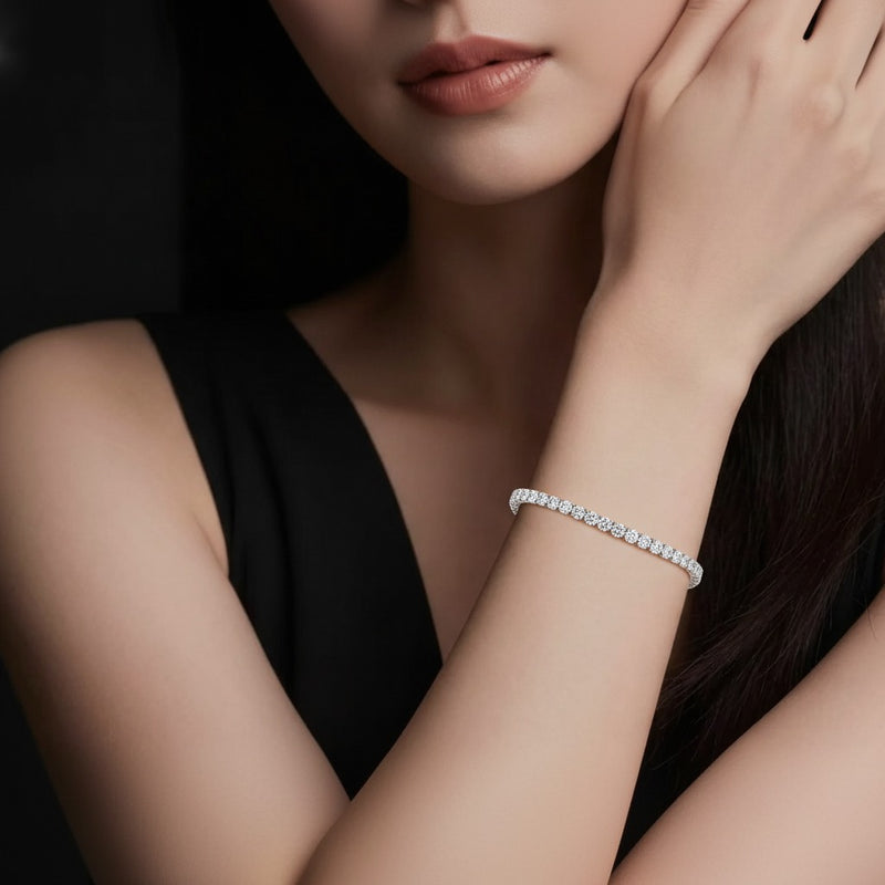 Model wearing oval east west bracelet
