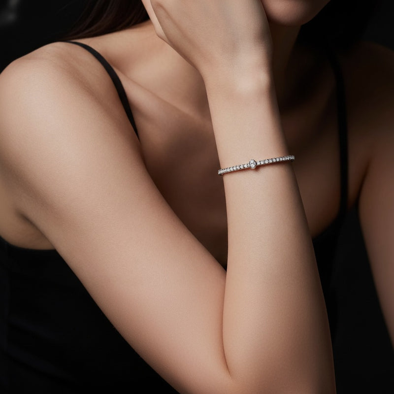 Model wearing pear east west station bracelet