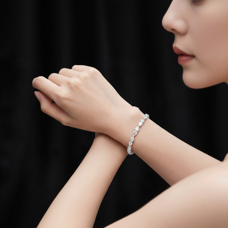 Model wearing pear fancy line bracelet