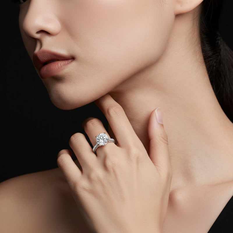 Model wearing round two tone accented rope design engagement ring