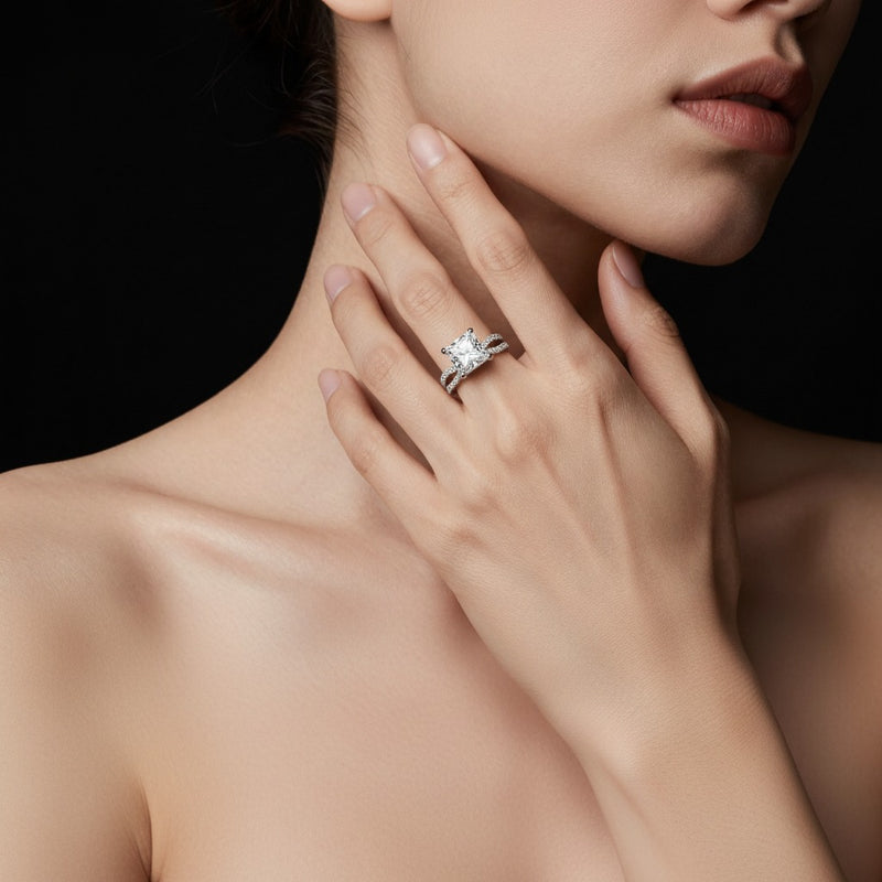 Model wearing princess cross shank accented engagement ring