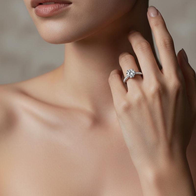 Model wearing round cross shank accented engagement ring