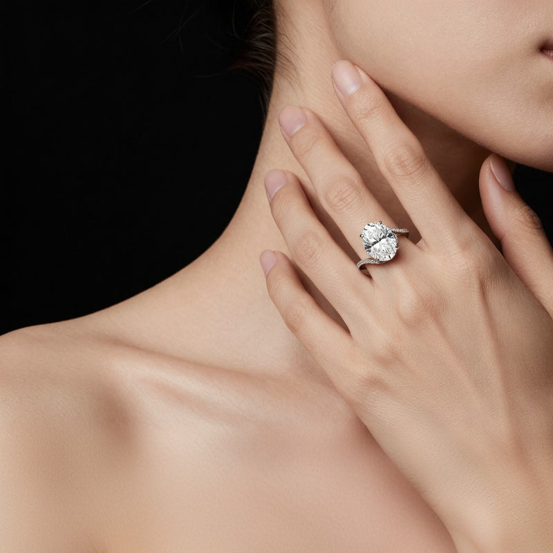 Model wearing oval swirl shank accented engagement ring
