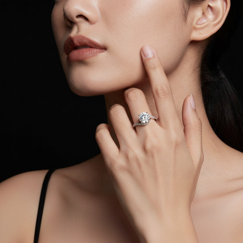 Model wearing round swirl shank accented engagement ring