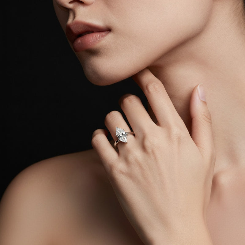 Model wearing marquise bypass shank engagement ring
