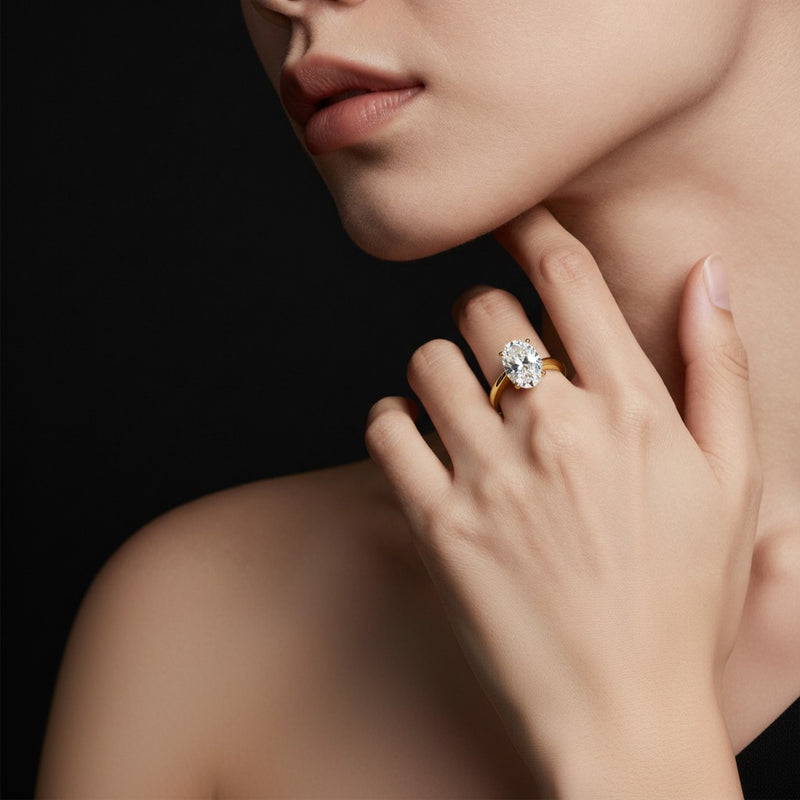 Model wearing oval bypass shank engagement ring