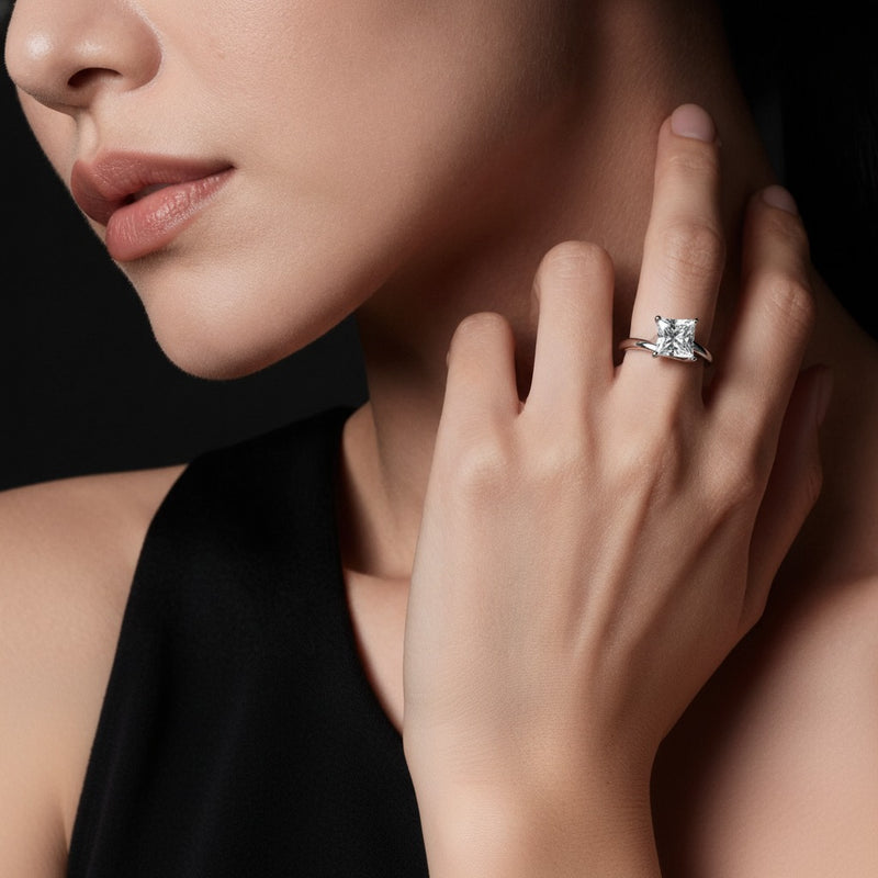 Model wearing princess bypass shank engagement ring