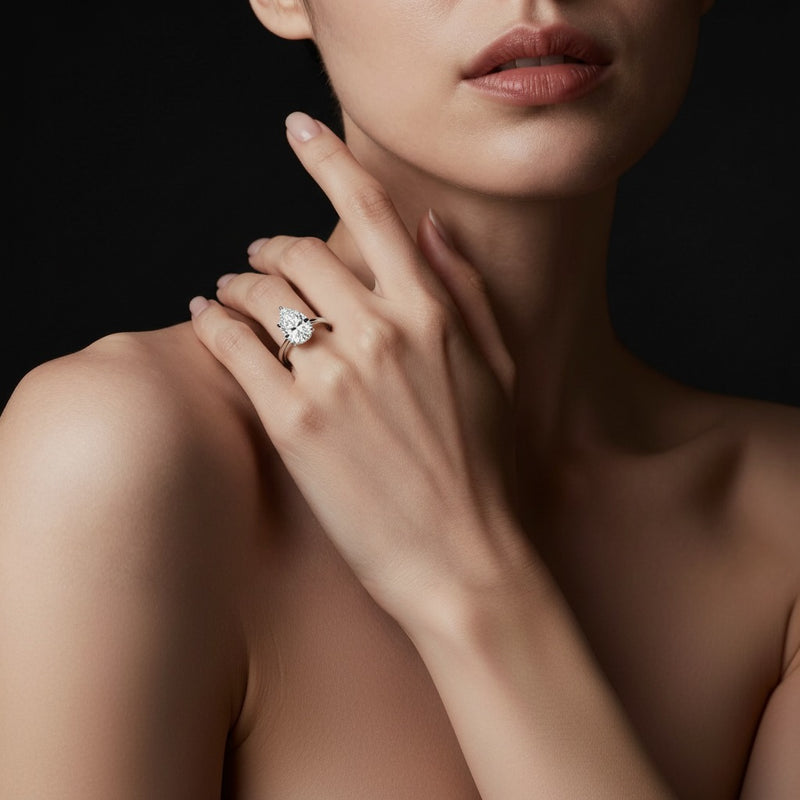 Model wearing pear ring