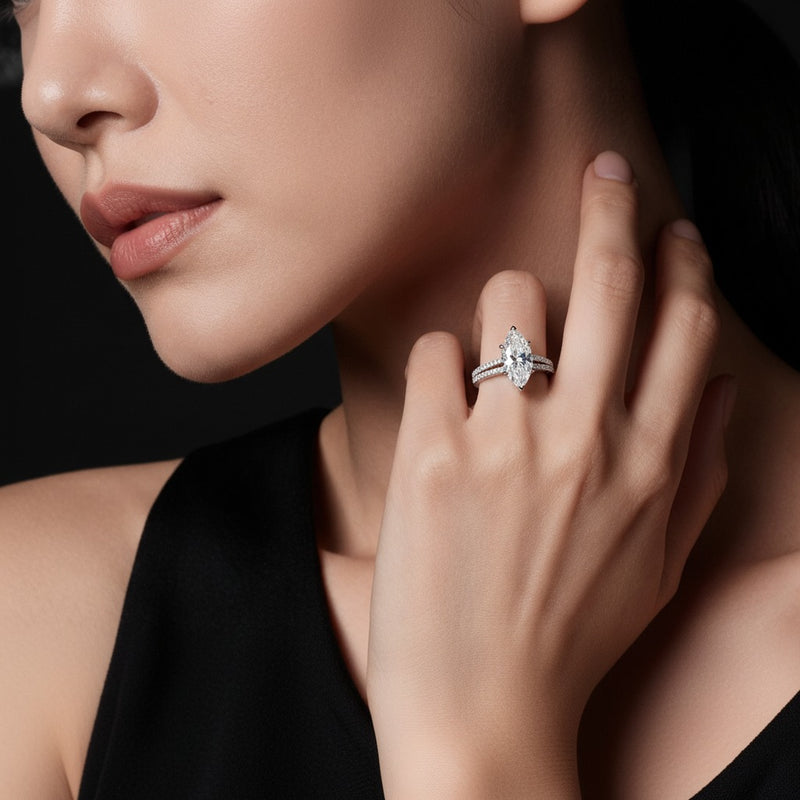 Model wearing marquise micro pave knife edge accent ring