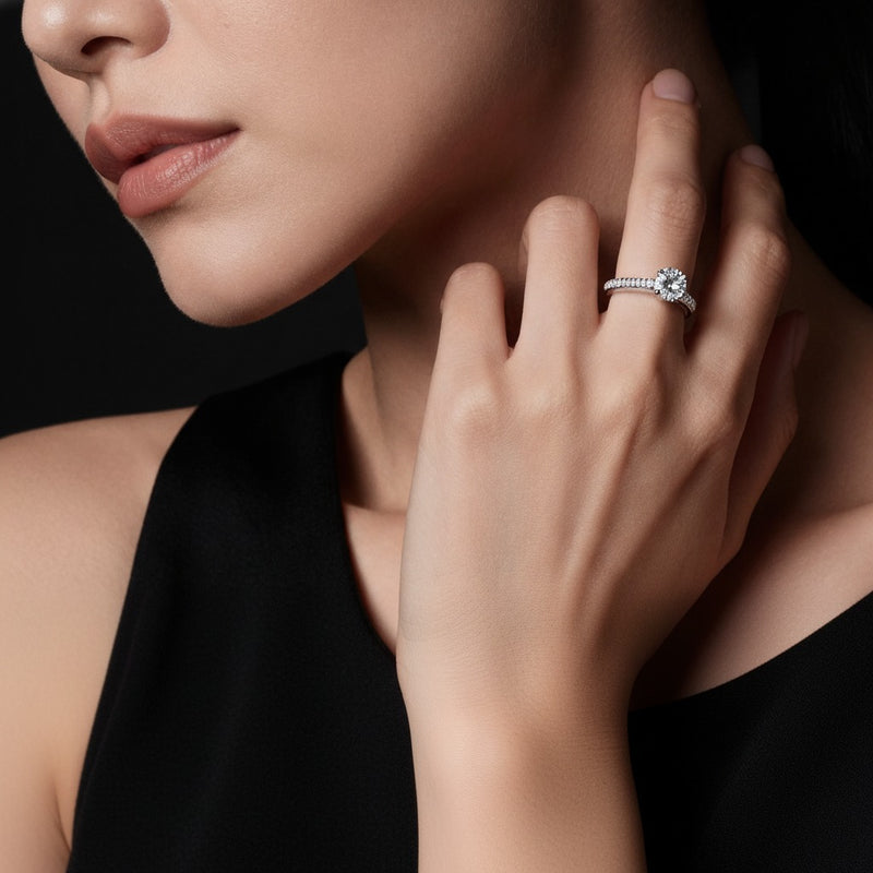 Model wearing round split shank trellis engagement ring
